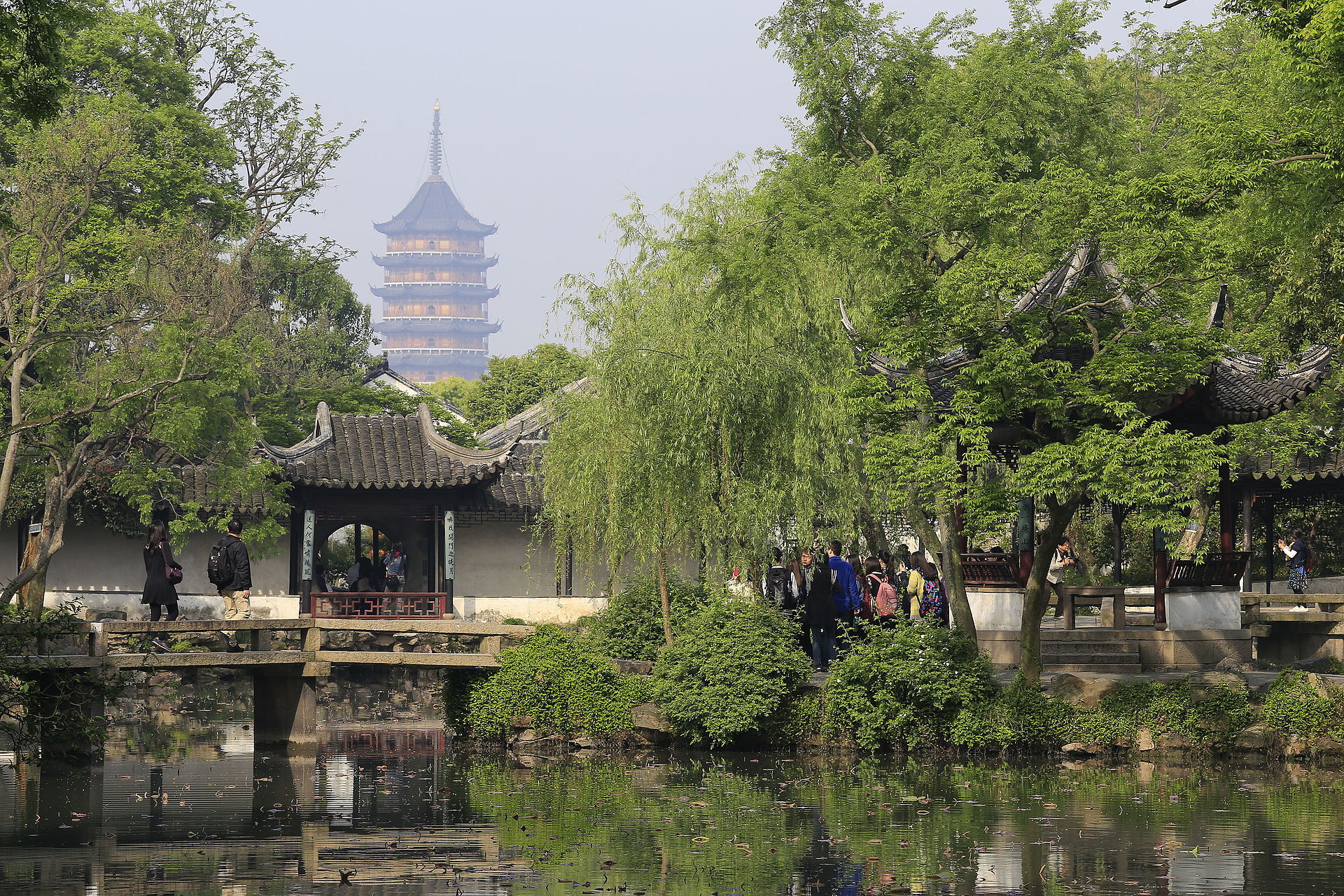 10 Things to do in Suzhou: Classical Gardens & Canals 4 Humble Administrator's Garden in Suzhou, China with pagoda in the background