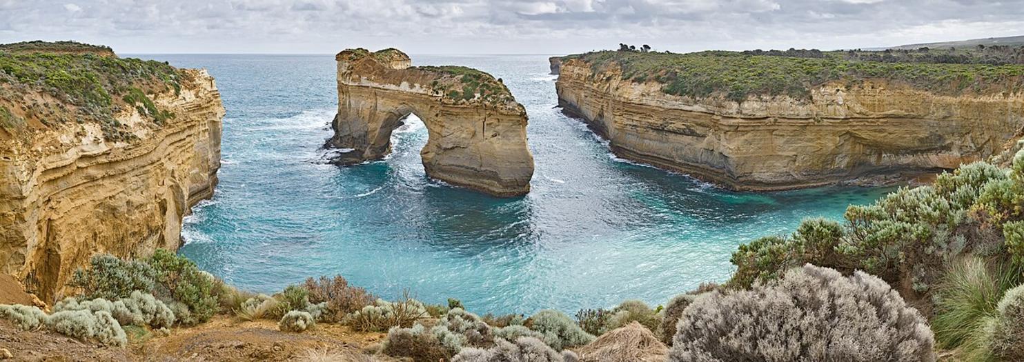 Hear waves crash against the limestone cliffs at Gibson Steps, the salty breeze mixing with eucalyptus from nearby trees.