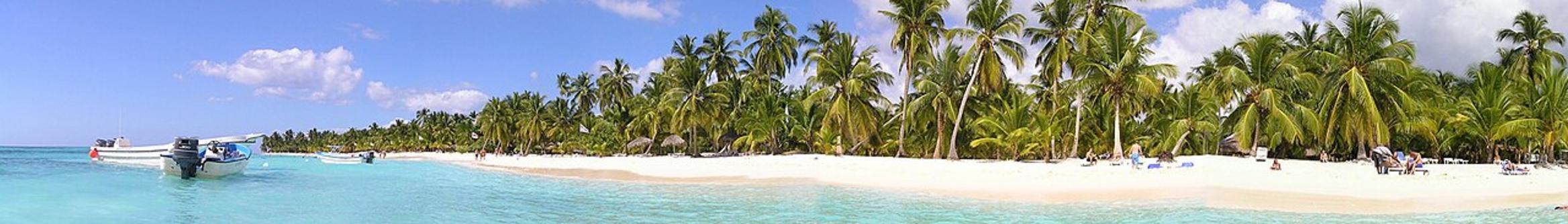 Feel the warm sand underfoot at Playa Catuano, where turquoise waves lap gently in the afternoon sun.