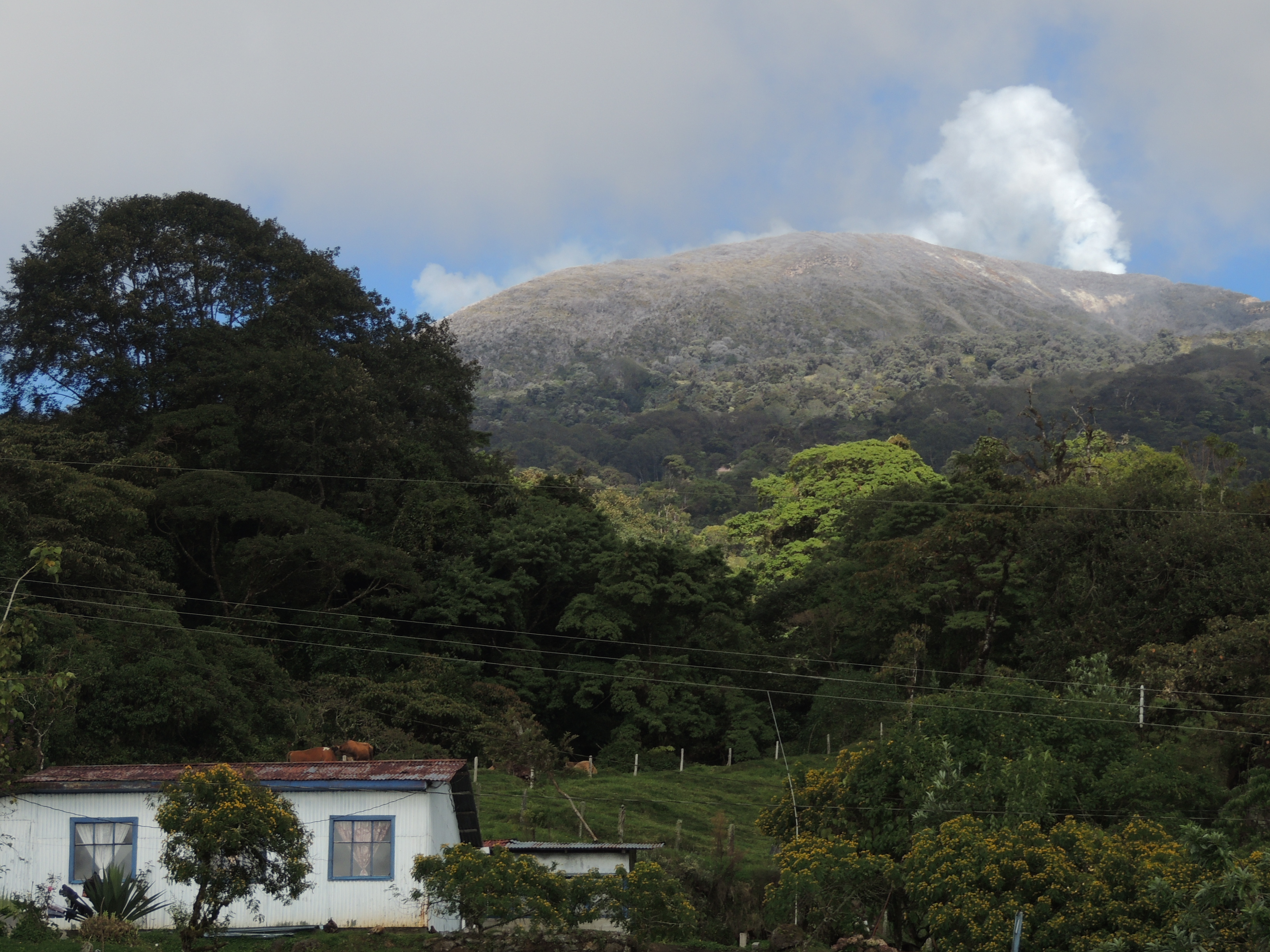 Costa Rica’s Most Beautiful Places: Volcanoes, Forests & Coastlines 8 Turrialba Volcano rising above farmland and forest